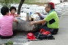 Picknicking by the Cheonggyecheon Stream, Seoul KR
