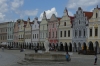 Colorful houses with arcades and ornamental gables ring Zachariáš of Hradec Square, Telč CZ