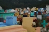 Coloured tombs at the Chichicastenango Cemetery. Colour represents the day of week the first interred died. GT