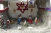 Nativity scene without baby Jesus, on Cruz Loma, Quito EC