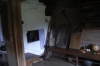Inside a home in the Museum of Wooden Architecture in Suzdal RU.  The layout was always the same - large stove, with beds in the rafters over it for the elderly and children.  Women's territory in front of the stove.