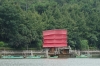 Chinese junk and bamboo rafts on the lake in Guilin, China