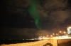 Aurora Borealis and the Imagine Peace Tower memorial to John Lennon, over Reykjavik Bay IS