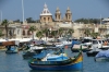 Colourful boats in the harbour of Marsaxlokk, Malta