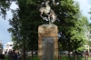 Cowboy statue and memorial to war dead, in town square of Jackson Hole, WY