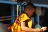 Monks on Th Sisavangvong - note the saffron coloured mobile phone, Luang Prabang LA