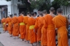 Giving alms to the Buddhist monks in early morning, Luang Prabang LA