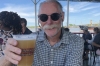 Bruce gets a decent beer (in plastic) on the Paddle Steamer Natchez, New Orleans LA