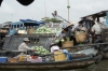Buying cabages at the floating market near Can Tho
