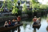 Tourists on the canal in Kurashiki, Japan