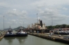 Tug boats in the second lock of the Panama Canal. Each lock rises 25 feet.