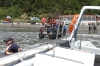 Boarding the Pinguinlan II at Point Almenao, Chiloé Island CL