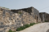 Umm Qays (ancient Roman city of Gadara) - more recent buildings using mixed sandstone and basalt from the ruins JO