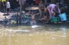 Family bath time in the Siem Reap River