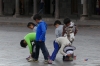Children playing a ball game in Plaza de Armas (Armoury), Cusco PE